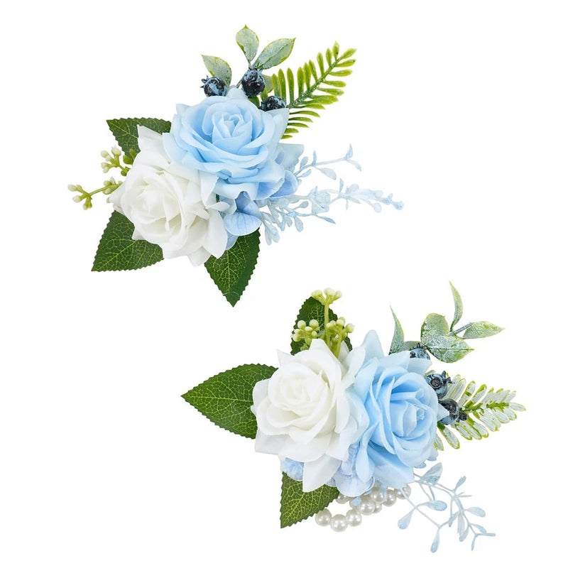 Light blue and white artificial rose corsage and boutonniere set with greenery