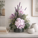 Lavender hydrangea and wildflower floral arrangement in galvanized container Hydrangea