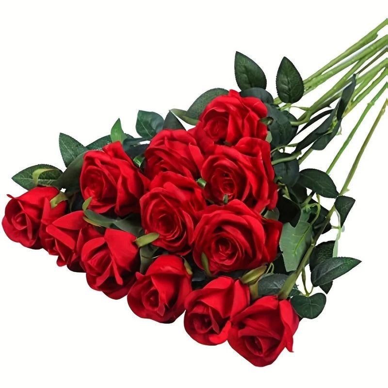 Artificial red rose bud bouquet with green leaves and stems