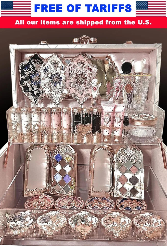 Ornate boxed makeup set with floral patterned bottles and decorative compacts