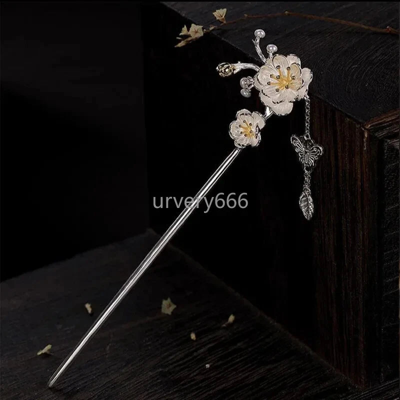 Silver-tone peony flower hairpin with dangling butterfly pendant and bead accents