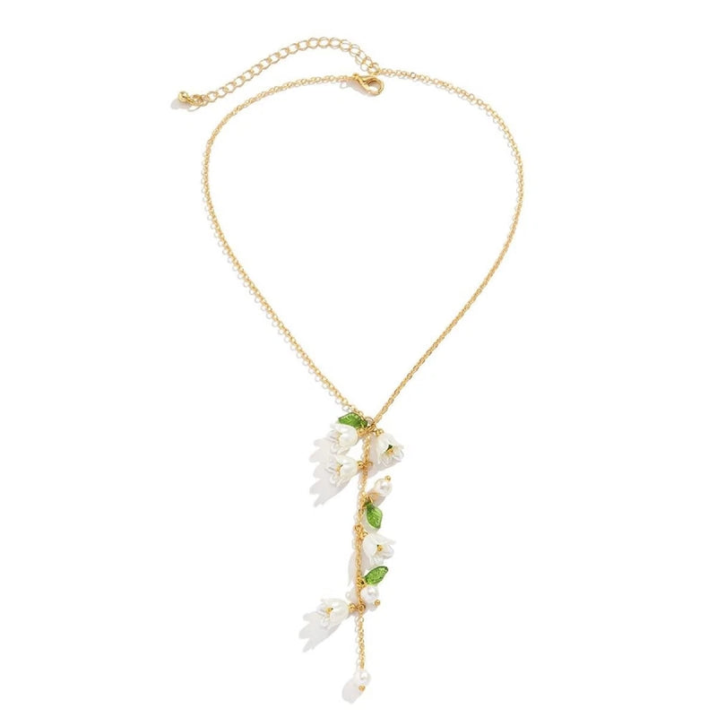 Dainty floral choker necklace with gold chain and white flower drop charm