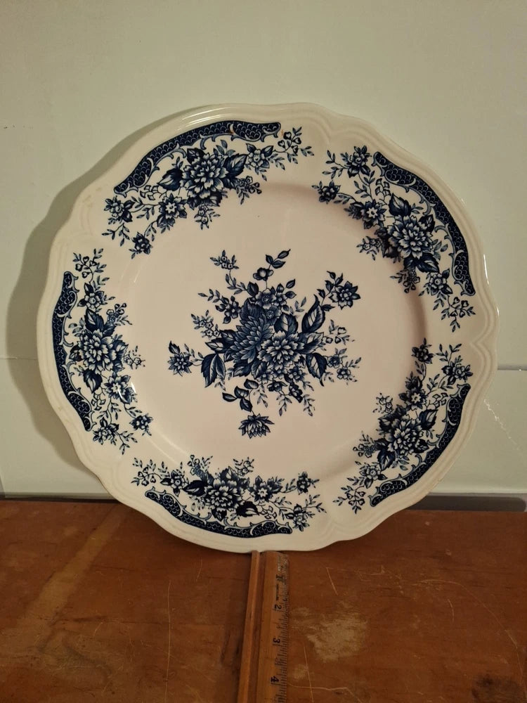 Round ironstone chop platter with blue floral border and center design