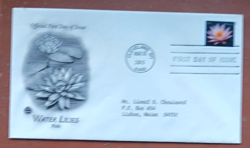 Light blue first day cover envelope with pink water lily floral cachet and stamp
