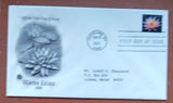 Light blue first day cover envelope with pink water lily floral cachet and stamp
