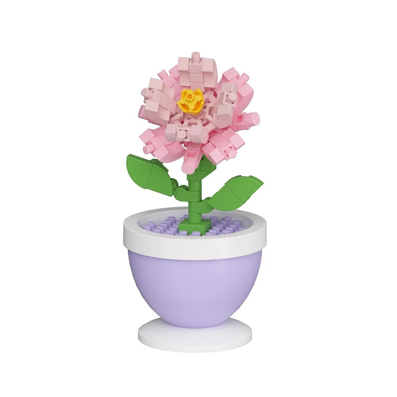 Mini flower bonsai building block set in a purple pot with pink blossom and green leaves