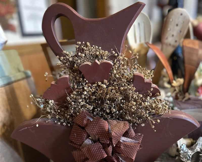Dried flower arrangement in a decorative Wooden Pitcher Dried Flower