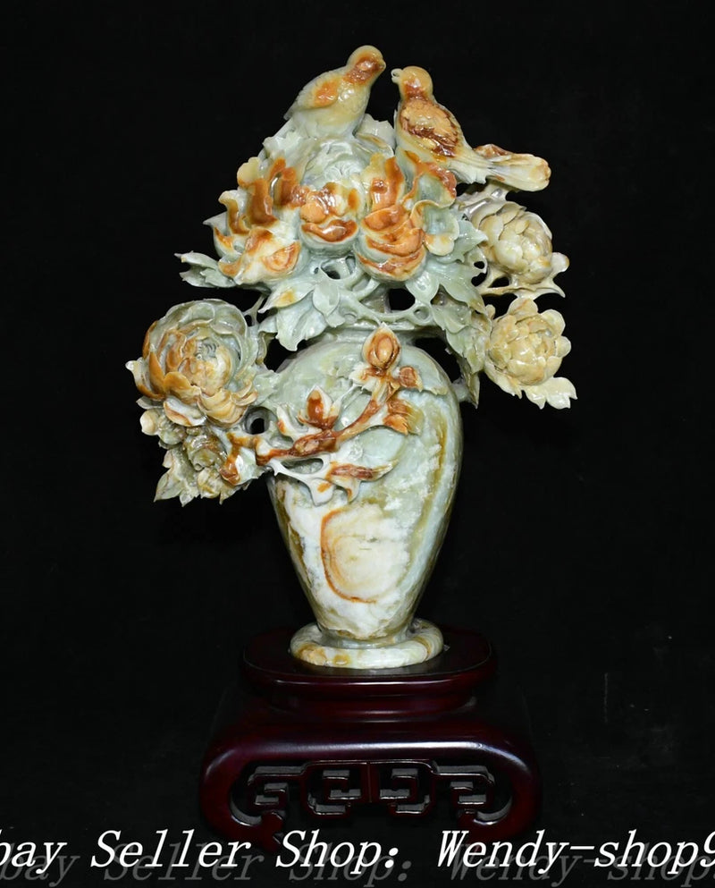 Carved cream peony jade bottle vase with birds and flowers on dark red wooden base