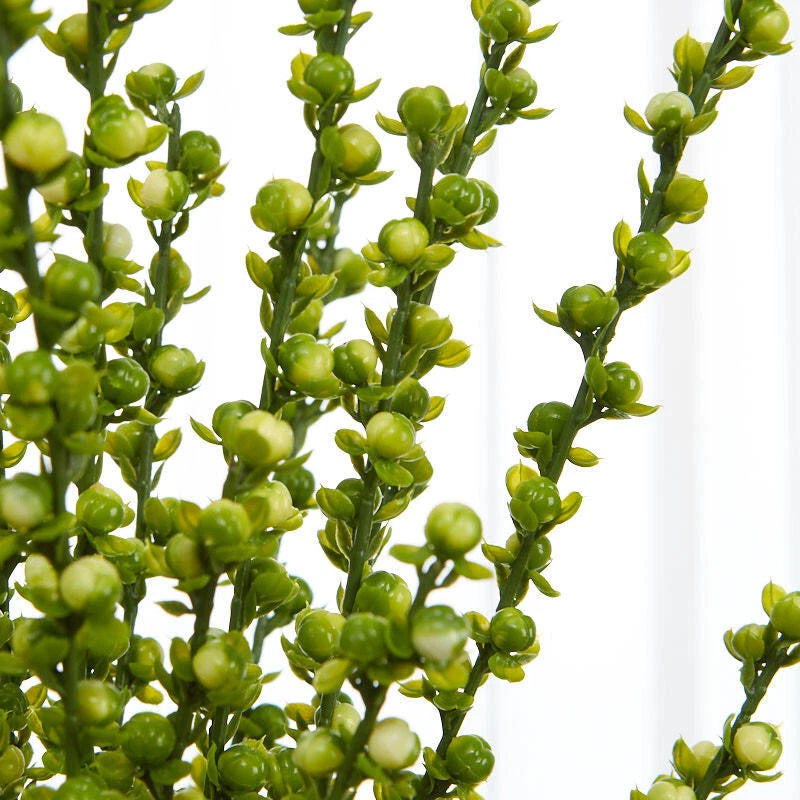 Artificial berry floral spray with clusters of green faux berries on stems