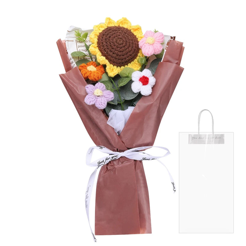 Handmade crochet flower bouquet in brown wrap with sunflower, roses, and small blossoms