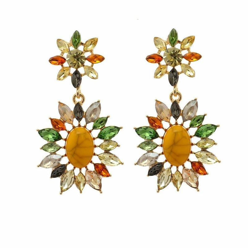 Amrita Singh sunflower crystal drop earrings with gold-tone centers and green leaf accents