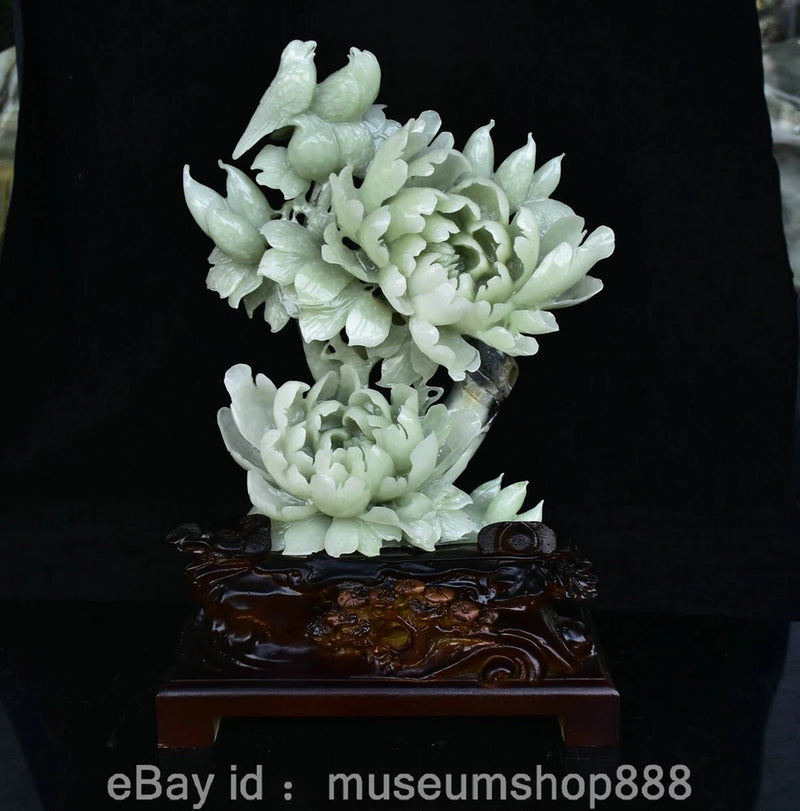 Natural jade-look peony flower bird sculpture with pale green blossoms on dark base