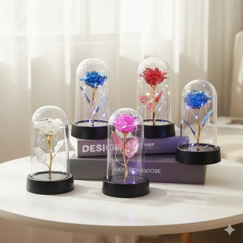Colorful LED rose under clear plastic dome with black circular base, gift decoration