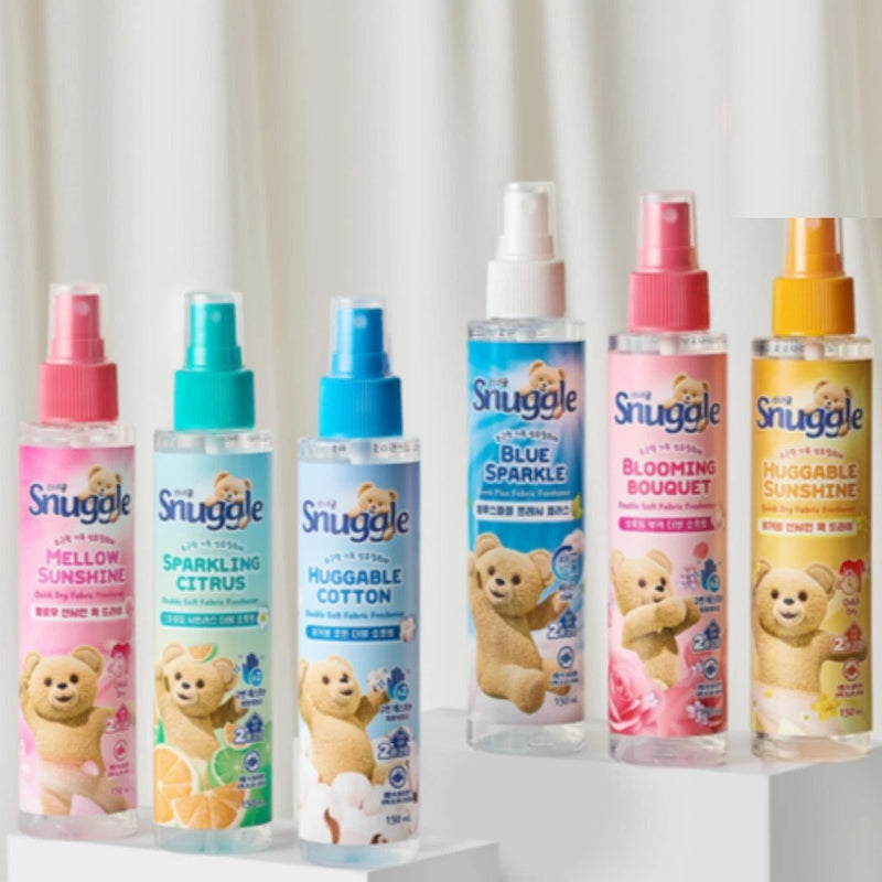 Pack of Snuggle fabric freshener spray bottles, assorted colors and teddy bear themed scents