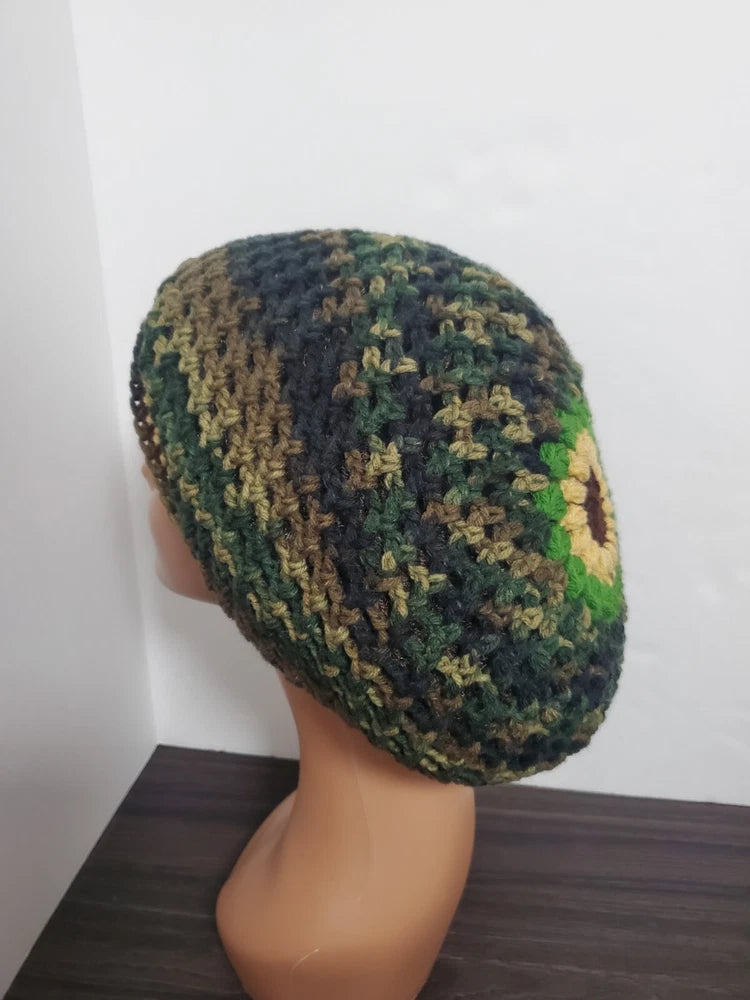 Camo crochet mesh beanie with sunflower patch, knit in green and dark brown