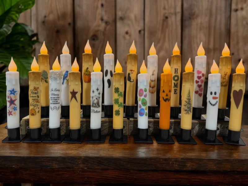 Battery-operated taper LED candles with timer, assorted printed designs, multiple colors