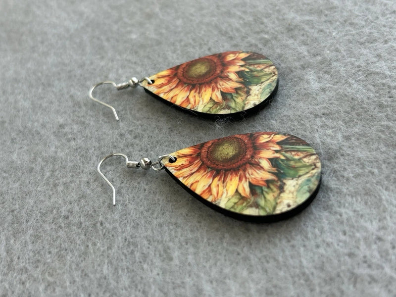 Sunflower print teardrop dangle earrings with silver-tone fishhook closures