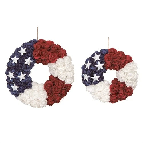 Patriotic rose wreath with blue star rosettes, red and white roses in a circular ring