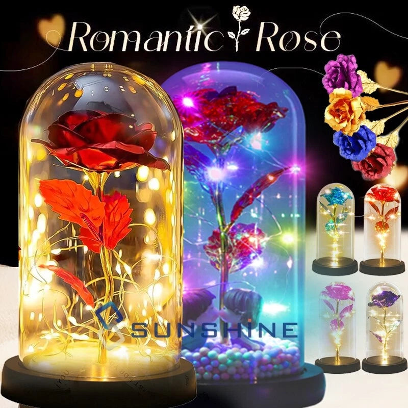 Lit glass dome rose crystal decoration with red flower inside on round base