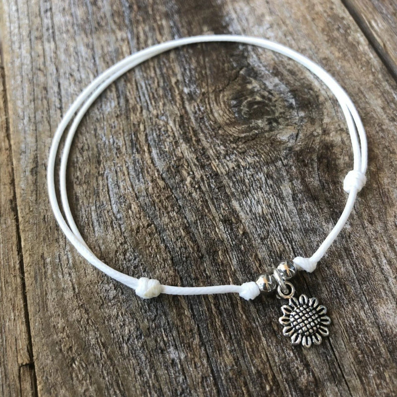 Sunflower charm anklet bracelet with white cord and small metal flower pendant