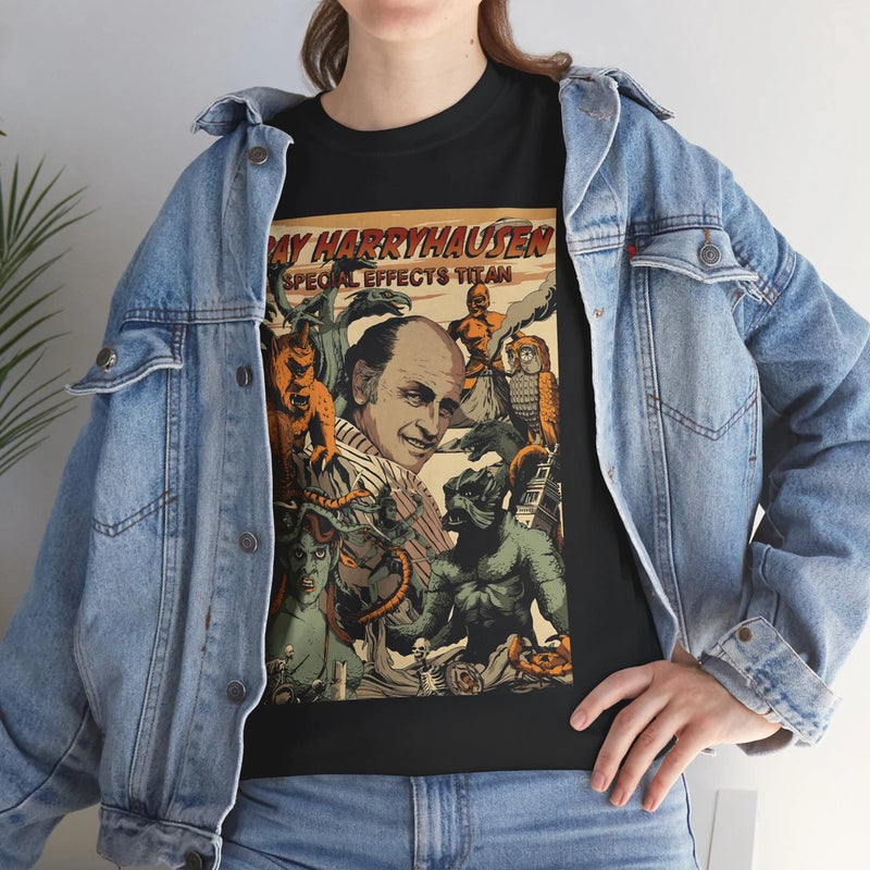 Black graphic T-shirt with sci-fi monsters and text, worn under light denim jacket
