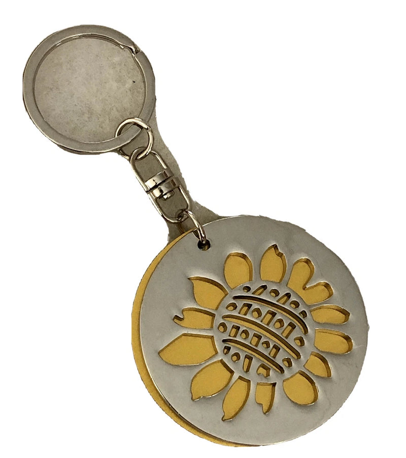 Silver-tone sunflower keychain with round medallion and yellow enamel flower on key ring