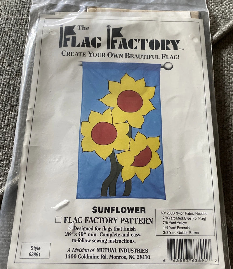 Sunflower flag pattern craft kit with blue panel and yellow sunflower design on package