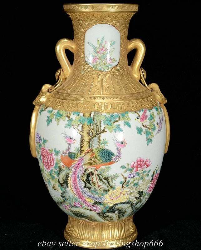 Pastel porcelain vase with peony floral and bird motif, two gold handles and ornate rim