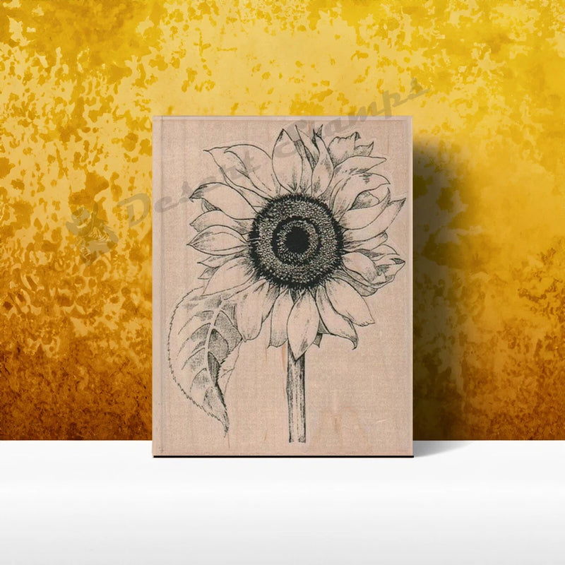 Sunflower rubber stamp with detailed flower line art and leaves on square block