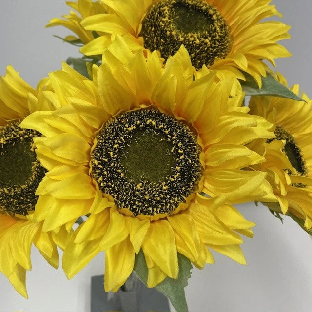 Artificial yellow sunflower bush with three large blooms and dark speckled centers