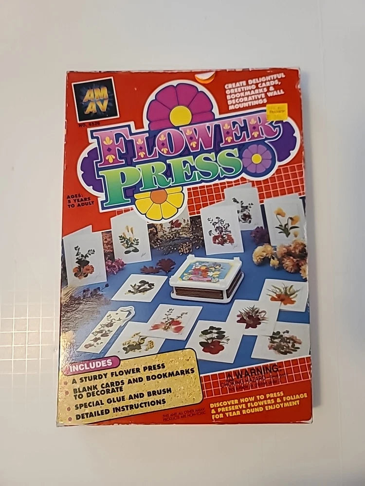 Flower pressing kit in boxed set with colorful cover and instruction art