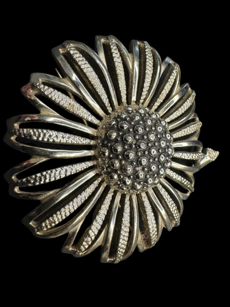 Vintage silver-tone sunflower brooch pin, textured petal rays with rhinestone center