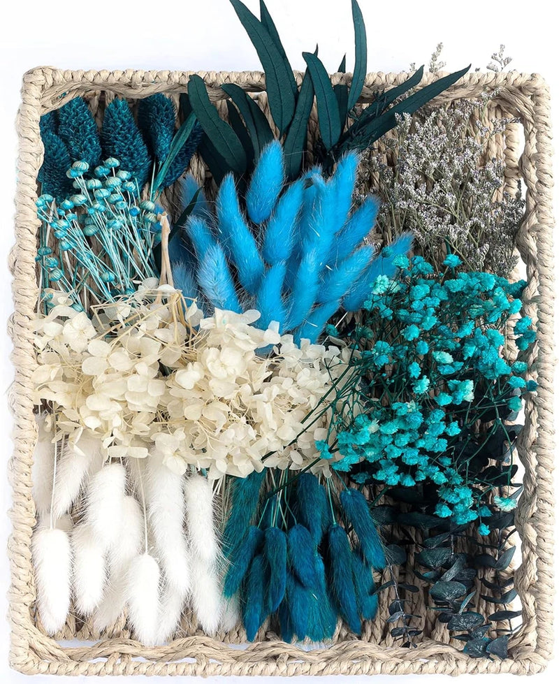 Preserved flower DIY kit with white and teal-blue dried blooms in woven tray
