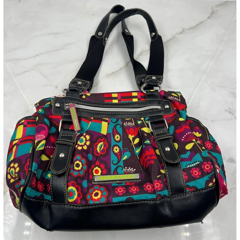 Colorful floral patchwork canvas shoulder bag with black trim, top handles, and front zip pocket
