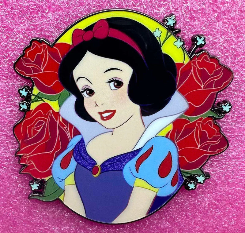 Snow White character portrait enamel pin with red roses and multicolor border