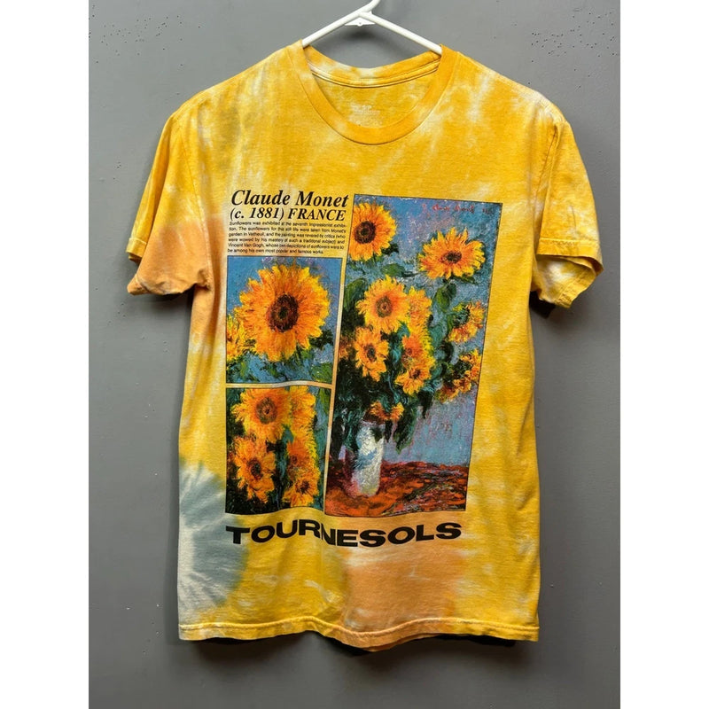 Yellow tie-dye T-shirt with Claude Monet sunflowers graphic and French text