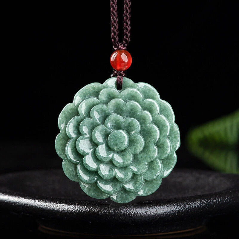 Green jadeite peony flower pendant with red bead cap on cord