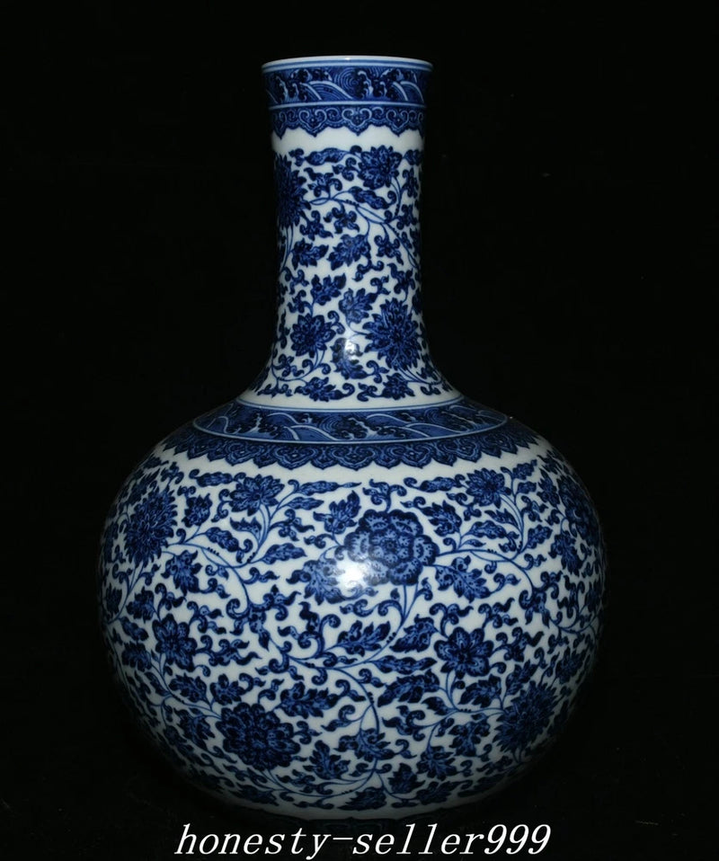 Blue-and-white porcelain bottle vase with floral peony pattern and tall neck