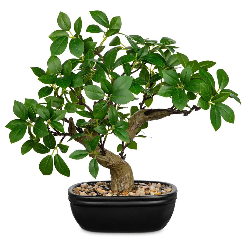 Artificial bonsai tree with green faux leaves, black ceramic pot and pebble base