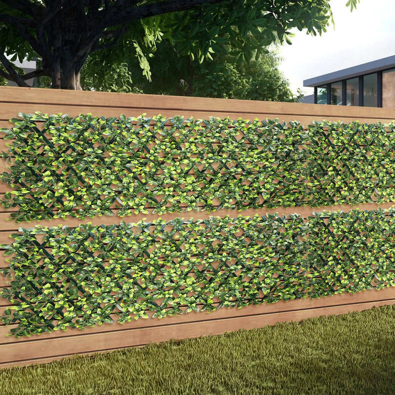Artificial green faux jasmine leaf fence panel with PVC backing, dense leafy coverage.