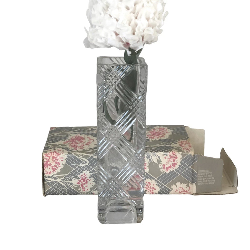 Faceted cut-crystal bud vase with diamond pattern, clear glass