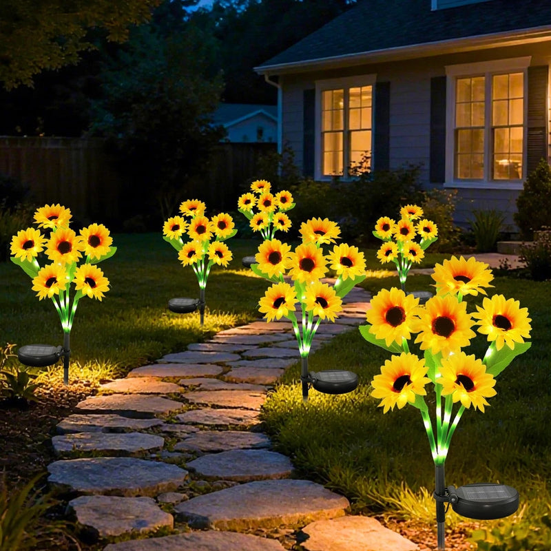 Solar sunflower garden lights, bright yellow sunflower heads on dark stake lights