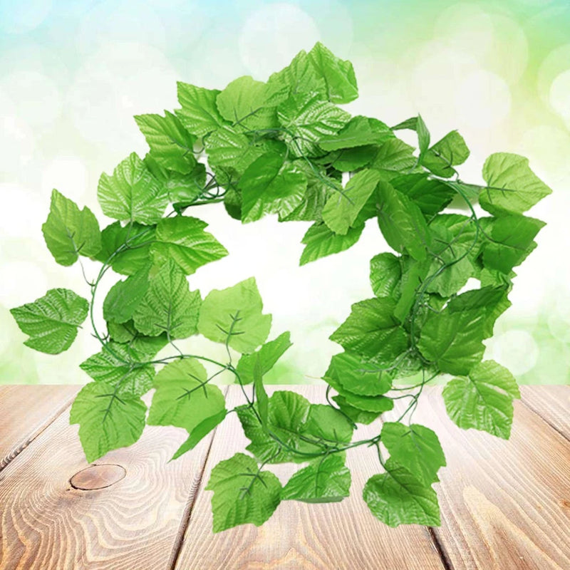 Artificial green faux vine plant with multiple realistic leafy leaves