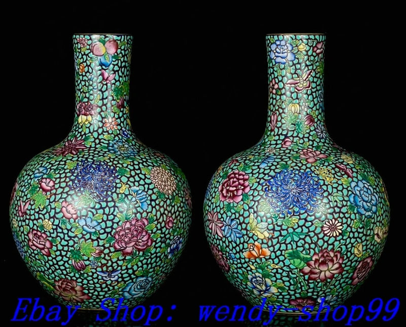 Decorative porcelain enamel vase pair with peony blooms, gilt accents, turquoise ground