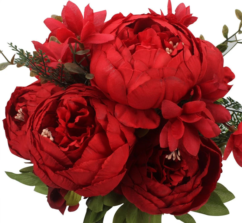 Artificial silk peony bouquet with red blooms and green leaves, bouquet arrangement