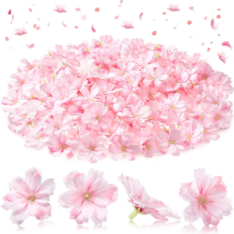 Artificial cherry blossom flower heads, light pink petals with small yellow stamens