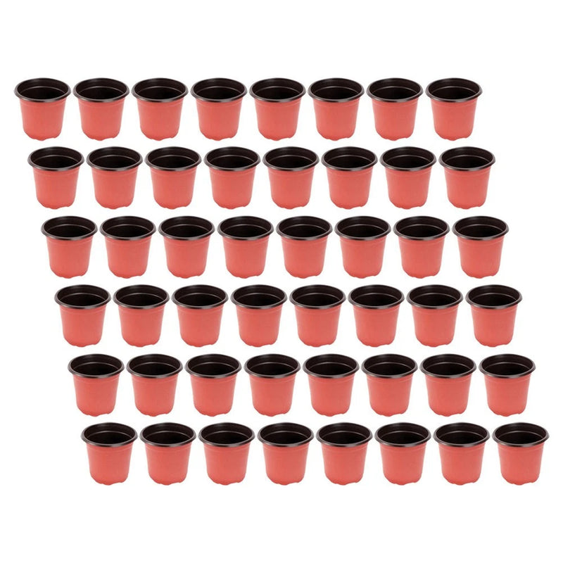 Set of 120 small red nursery planter pots with black rims and drainage holes