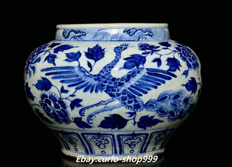 Blue-and-white porcelain ginger jar with peacock and peony floral pattern