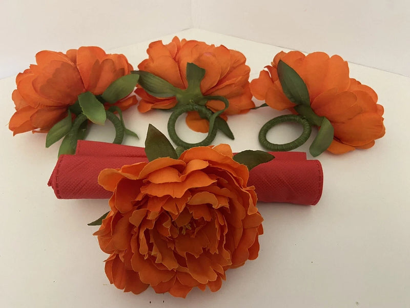 Set of 4 orange floral peony napkin ring holders with decorative flower centers