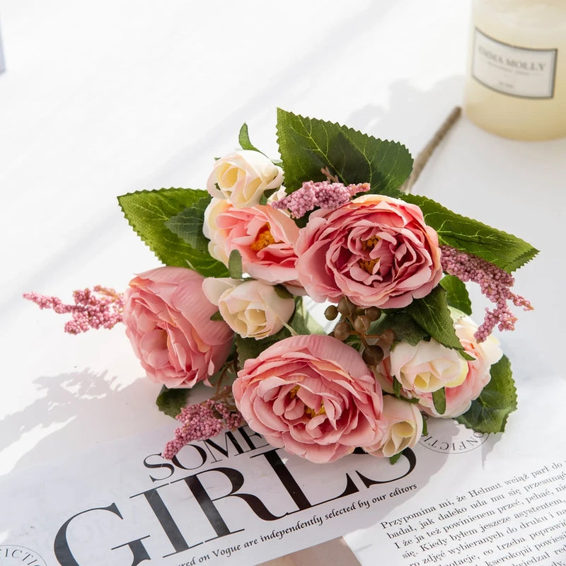 Artificial peony bouquet with pink and cream blooms and green leaves for a vase